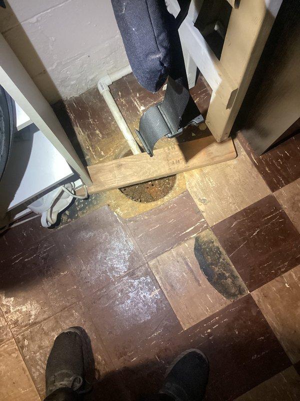 Conducted site assessment for backflow valve installation on two basement floor drains following contaminated water flooding incident. Documented existing conditions including floor drain locations, surrounding plumbing infrastructure, and water damage evidence. Prepared comprehensive project estimate for backflow prevention device installation to protect against future sewage backup and contamination events.