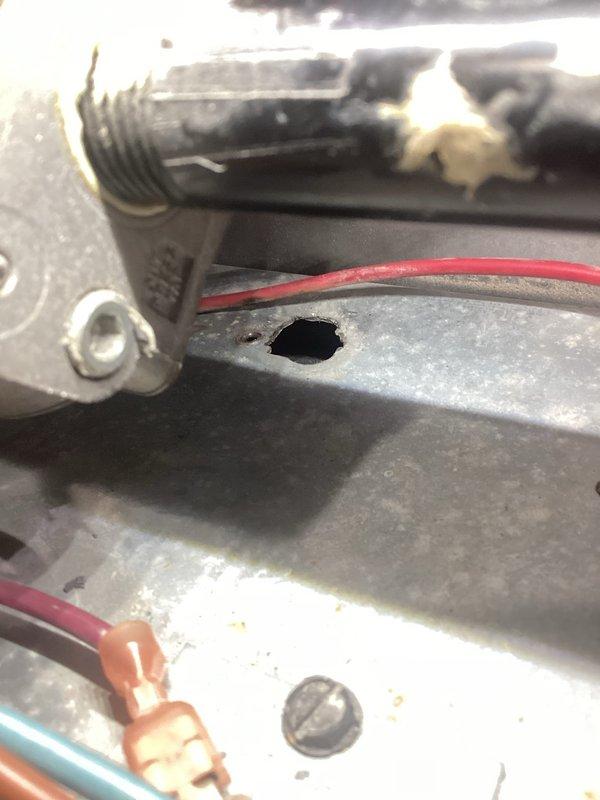 Responded to no-heat call on 21-year-old Goodman furnace with blower operation but no ignition. Customer had attempted to replace ignition rod, but new component failed during heating cycle. Upon inspection, diagnosed failed hot surface ignitor and assessed burner assembly condition. Replaced faulty hot surface ignitor with OEM-compatible component, verified proper electrode positioning and clearances, and tested ignition sequence through multiple heating cycles. System restored to full operational status with proper flame sensing and reliable ignition.