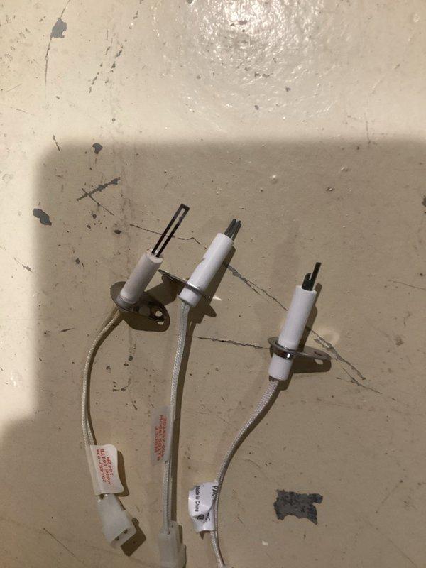 Responded to no-heat call on 21-year-old Goodman furnace with blower operation but no ignition. Customer had attempted to replace ignition rod, but new component failed during heating cycle. Upon inspection, diagnosed failed hot surface ignitor and assessed burner assembly condition. Replaced faulty hot surface ignitor with OEM-compatible component, verified proper electrode positioning and clearances, and tested ignition sequence through multiple heating cycles. System restored to full operational status with proper flame sensing and reliable ignition.