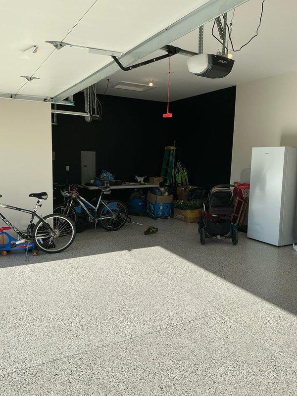 Conducted on-site estimate for garage heating solutions in a well-maintained residential attached garage with epoxy flooring. Evaluated electrical panel capacity and existing infrastructure to determine feasibility of installing a unit heater system. Assessed space layout, clearances, and power availability to provide heating options for the approximately 2-car garage space.