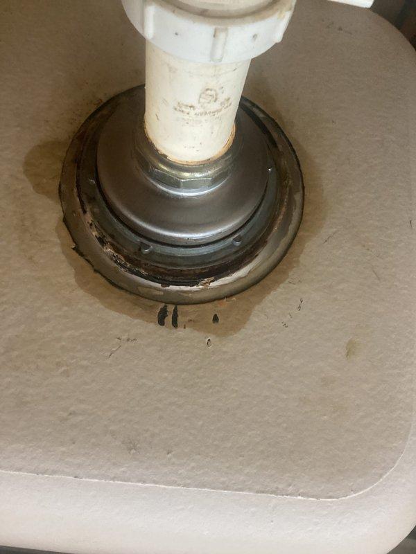 Responded to reported leaking toilet on upper level and slow leak under kitchen sink, both present for approximately 30 days. Upon inspection, identified compromised wax ring seal at toilet base causing water seepage onto bathroom floor. Removed toilet, replaced deteriorated wax ring with new standard seal, reinstalled toilet with proper bolting and alignment to floor flange. Verified secure seal and tested for leaks. Kitchen sink leak assessment and repair also completed during service call.