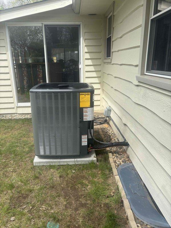 Completed full air conditioning system replacement including outdoor condensing unit and indoor air handler. Installed new outdoor unit on existing concrete pad with proper clearances and drainage, connected refrigerant lines, and verified electrical connections. Replaced indoor air handler in basement utility area with new ductwork connections, installed condensate drain piping, and ensured proper airflow throughout system. System tested and operational upon completion.