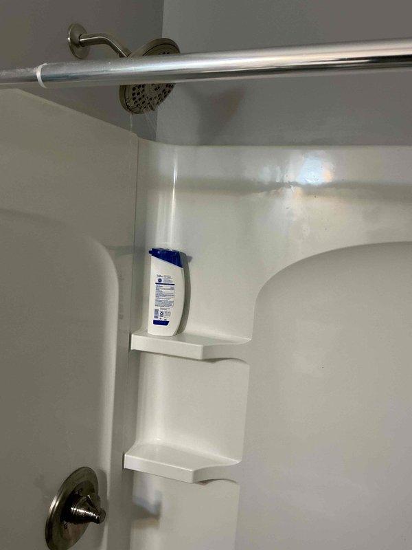 Responded to no hot water complaint on 6-year-old tankless water heater. Upon arrival, tested all hot water fixtures throughout home and found unit operating properly with adequate hot water temperature and flow at both shower and sink locations. Verified proper ignition sequence, burner operation, and temperature output. System functioning as designed with no issues found at time of service.