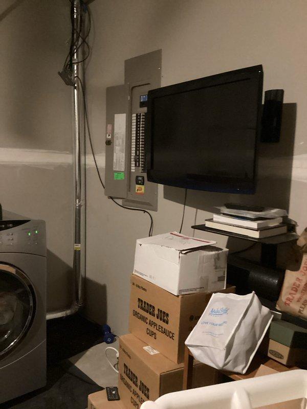 Completed laundry room addition installation including all necessary plumbing connections for new front-loading washing machine. Installed water supply lines, drain connections, and verified proper operation of the appliance in the utility room space.