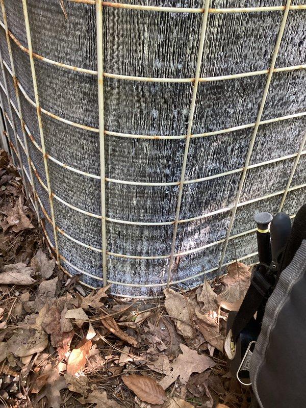 Responded to humidifier leak complaint and performed system inspection. Upon arrival, examined outdoor HVAC unit and accessed internal components to diagnose the issue. Inspected humidifier sight glass, which revealed discolored, murky water indicating contamination and potential mineral buildup in the system. The condition of the fluid confirmed active leaking concerns and need for humidifier maintenance. Documented equipment condition with photos showing exterior unit with protective guard and internal components including wiring and fluid levels. Due to scheduling constraints, AC tune-up was deferred and will require separate appointment.
