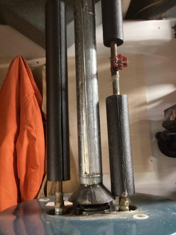 Completed annual cooling maintenance on 16-year-old Goodman air conditioning system. Performed comprehensive tune-up including inspection of refrigerant lines, condensate drain system, and associated plumbing connections. Verified proper operation of all mechanical components and documented equipment condition with photographic records showing pipe insulation integrity and condensate management system functioning correctly.