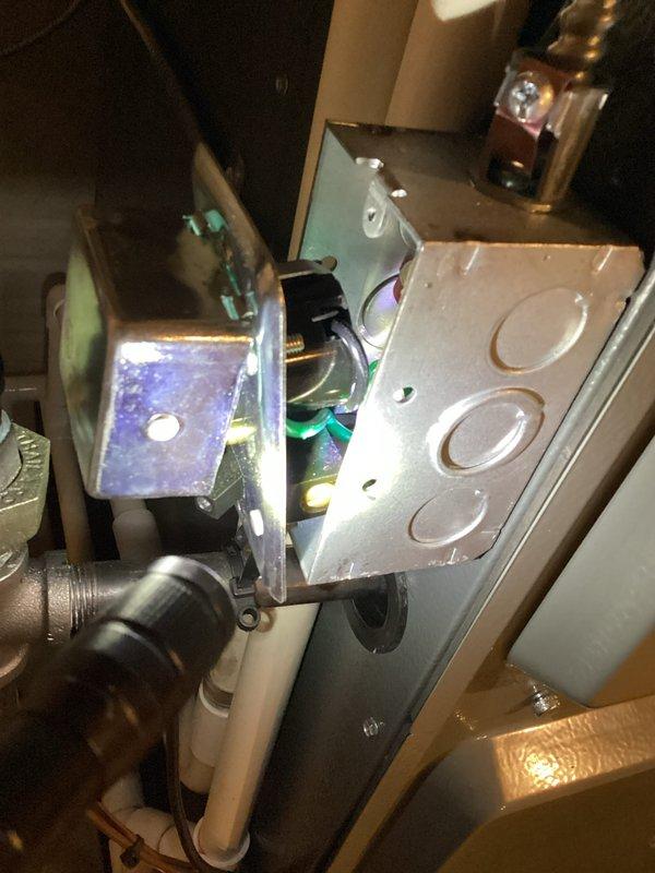 Performed further diagnosis on HVAC system gas valve assembly and control components. Inspected gas valve mounting, electrical connections, and associated wiring harness. Documented internal furnace components including control panel, junction box, and gas piping connections for quoted repair assessment.
