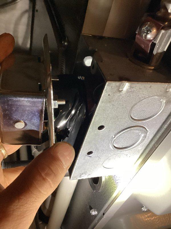 Performed further diagnosis on HVAC system gas valve assembly and control components. Inspected gas valve mounting, electrical connections, and associated wiring harness. Documented internal furnace components including control panel, junction box, and gas piping connections for quoted repair assessment.
