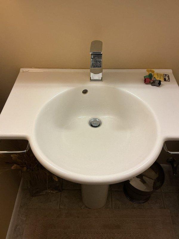 Serviced three bathroom sinks throughout the residence. Repaired non-functioning drain stoppers on two upstairs sinks, restoring proper open/close operation. Cleared plugged drain on one upstairs sink to restore proper drainage. Removed, cleaned, and reinstalled mesh drain screen in downstairs bathroom that homeowner was unable to loosen. All fixtures tested and confirmed operational upon completion.