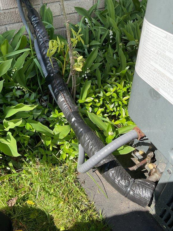 Completed annual heating and cooling tune-up on two 14-year-old Goodman systems, including air conditioning units, furnaces, and humidifier. Performed comprehensive inspection and maintenance of both HVAC systems, checked refrigerant lines and insulation on exterior condensing units, and inspected sump pump per client request. All equipment operational and ready for seasonal use.