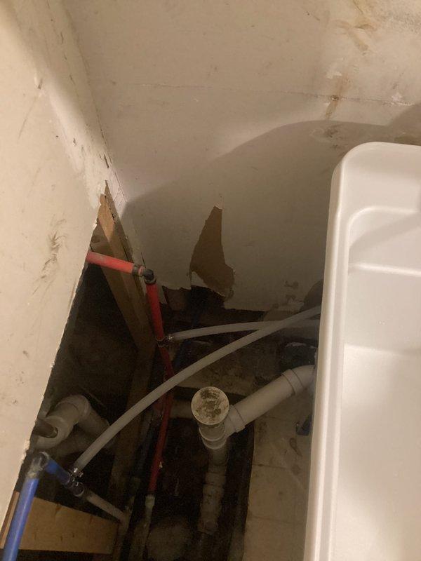 Installed client-supplied utility sink in basement utility room, including mounting basin on metal leg frame, connecting chrome dual-handle faucet, and completing all necessary plumbing connections to existing water supply lines and drain system. All connections tested and verified leak-free upon completion.