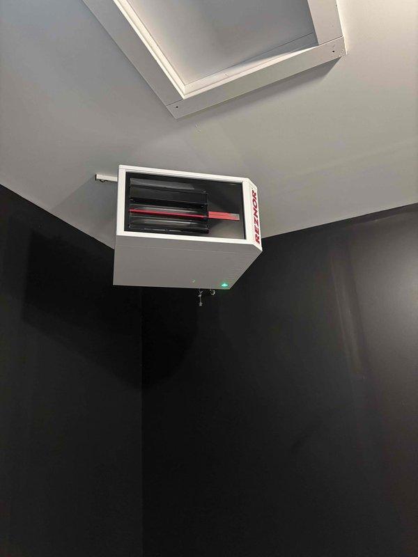 Installed new Reznor unit heater in corner-mounted ceiling configuration. Connected gas supply line with appropriate shut-off valve and completed all electrical and ventilation connections. Verified proper operation of heating elements and controls upon startup.