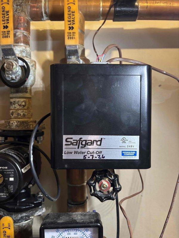 Returned to diagnose boiler that was continuously running without shutting off properly. Upon inspection, identified faulty Safgard Low Water Cut-Off control unit (Model 24-SV) that was preventing the system from cycling correctly. Tested electrical connections, transformer operation, and control circuitry to confirm the malfunction. Completed necessary repairs to restore proper boiler operation and cycling functionality.
