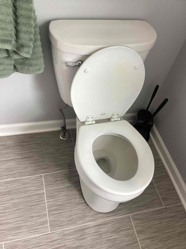 Pulled and reset toilet to address underlying issue. Removed toilet from floor flange, inspected wax ring and flange condition, and reinstalled unit with new wax seal. Reconnected water supply line, tested for proper flush operation and verified no leaks at base or supply connection. Toilet restored to full working order.