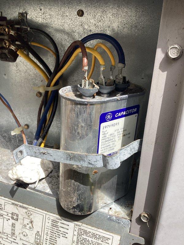 Completed annual cooling maintenance on 2014 AC system. Inspected condensate pump assembly and drain pan, verifying proper operation and drainage. Evaluated electrical components including GE capacitor, contactor, and associated wiring connections; all components tested within specifications and functioning properly.