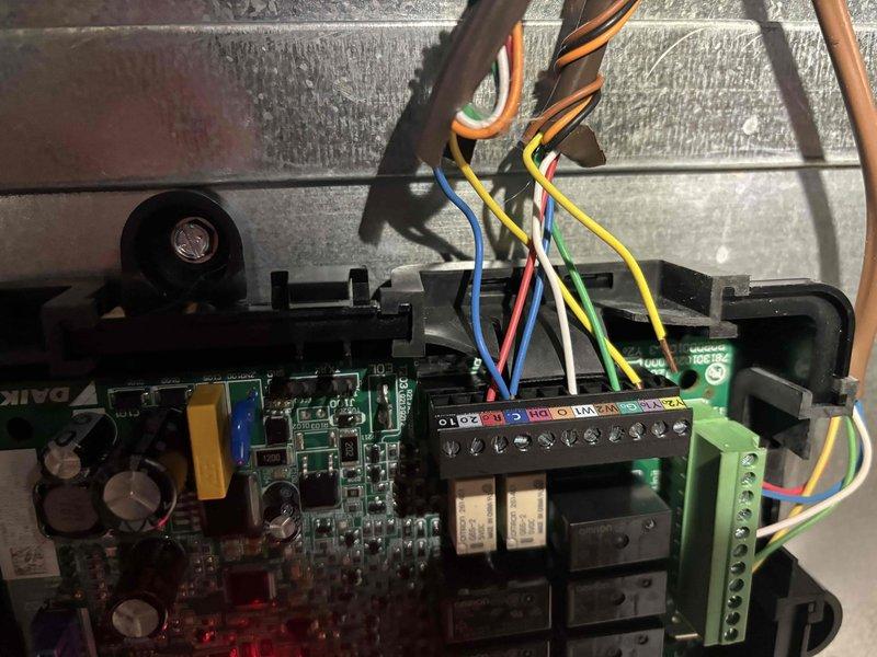 Responded to no heating or cooling complaint on newly installed EnergiAir WT 4-2036 system with thermostat displaying "no power to RC wire" error. Upon inspection, found Emerson control board with improper wiring connections at terminal strip. Corrected RC wire connection to provide proper 24V power supply to thermostat, verified all low-voltage wiring terminations at control board, and confirmed proper communication between thermostat and HVAC system. Tested system operation in both heating and cooling modes to ensure full functionality restored.