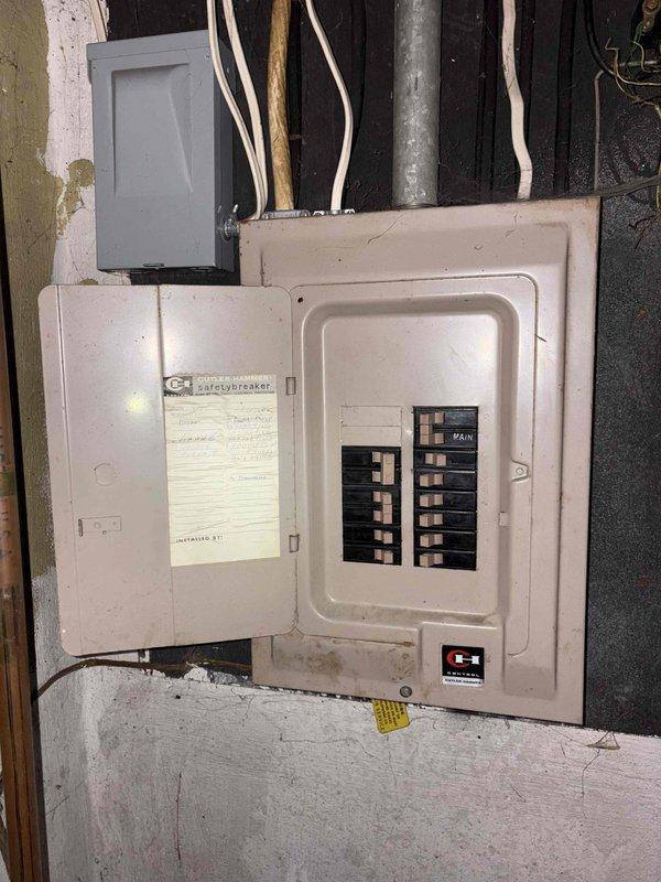 Conducted comprehensive estimate for furnace and air conditioning system replacement. Assessed existing HVAC infrastructure in basement utility area, documenting current electrical panel configuration with dual-column breaker arrangement and main disconnect, along with associated junction boxes and conduit routing. Evaluated mechanical room layout including existing ductwork, gas piping, condensate drainage, and electrical supply requirements to determine optimal equipment placement and installation specifications for new heating and cooling equipment.