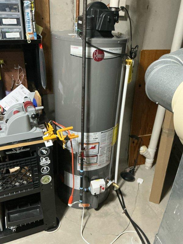 Conducted on-site evaluation for furnace and air conditioning system replacement. Both units are 16 years old and nearing end of service life. Assessed existing HVAC infrastructure including ductwork, humidifier integration, and refrigerant line routing in basement mechanical space. Documented current system configuration featuring air handler with attached humidification equipment and identified replacement requirements for aging heating and cooling equipment. Provided comprehensive replacement estimates for furnace-only option and combined furnace/AC system upgrade.