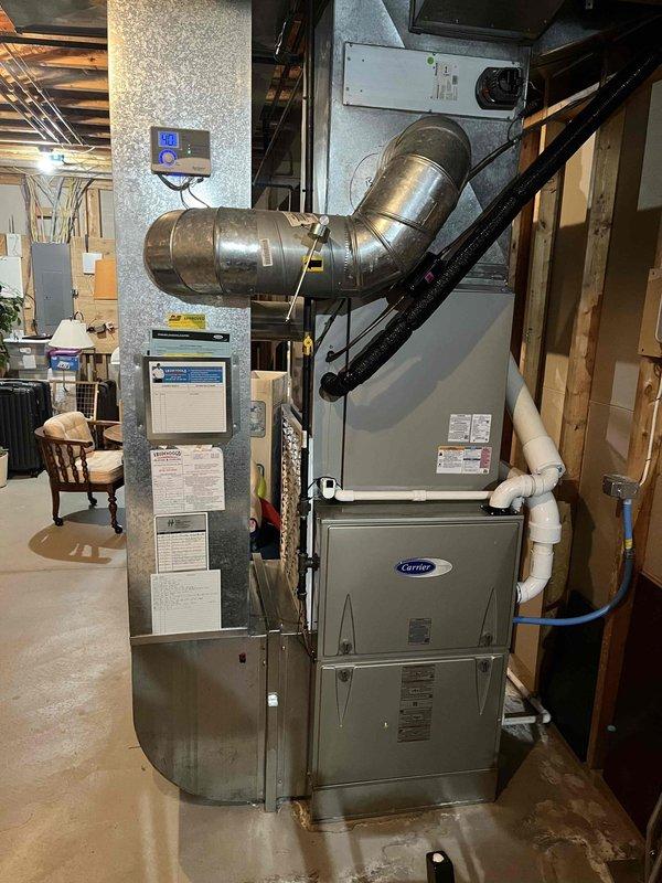 Completed annual cooling maintenance on Carrier HVAC system. Performed comprehensive tune-up including inspection of outdoor condenser unit, verified refrigerant levels, cleaned condenser coils, checked electrical connections and controls, tested thermostat operation, and inspected condensate drain system. All components operating within manufacturer specifications. System ready for cooling season.