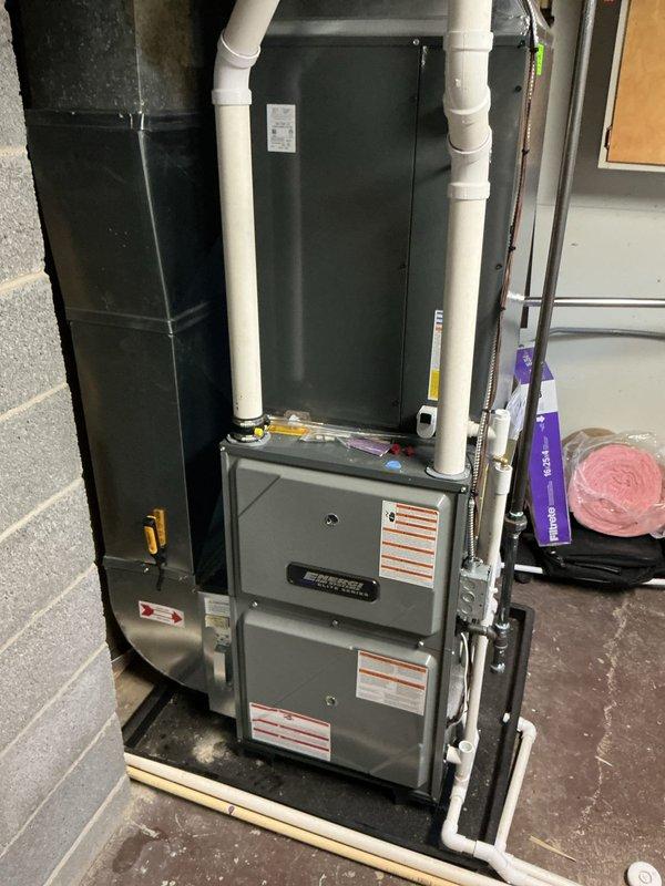 Completed annual cooling maintenance and AC tune-up on residential HVAC system. Performed comprehensive inspection of furnace, air handler, and associated ductwork in basement mechanical room. Verified proper operation of all system components, checked refrigerant levels, cleaned condenser coils, and inspected PVC condensate drain lines for proper flow. Tested thermostat operation, examined electrical connections, and confirmed adequate airflow through supply plenum and metallic ductwork. System operating within manufacturer specifications with no issues identified. Unit ready for cooling season under active warranty coverage through November 2034.