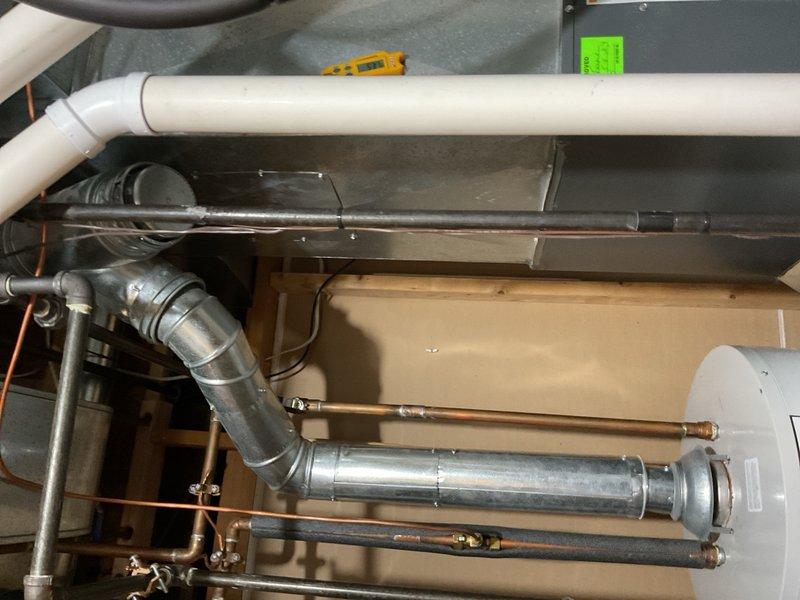Completed annual cooling maintenance on 10-year-old Goodman system installed in 2022. Performed comprehensive tune-up including inspection of air handler, ductwork connections, and refrigerant lines. All copper piping, galvanized ductwork, and mechanical components inspected and found to be in proper working condition with normal operational wear. System operating within manufacturer specifications.