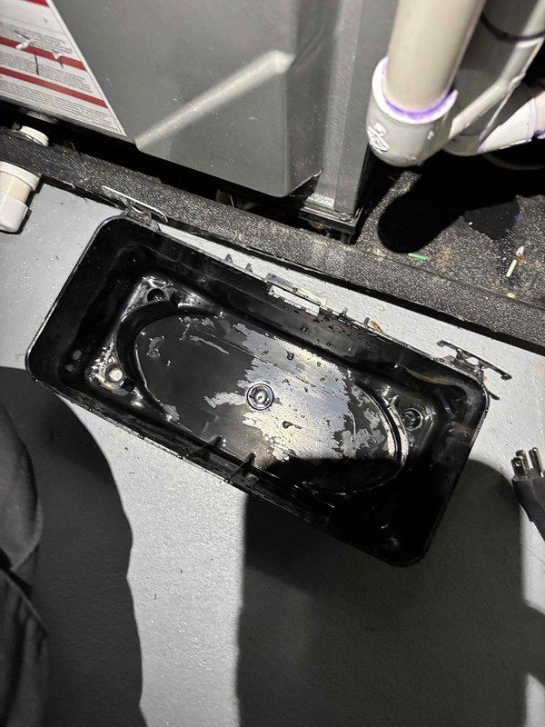 Completed annual cooling maintenance on 0-year-old ENE WT 8-2030 system. Performed comprehensive inspection of condensing unit and air handler components. Inspected drain pan and confirmed proper condensate drainage with standing water present in collection tray. Checked electrical connections, capacitors, and wiring throughout system. Examined blower assembly, evaporator coil access area, and condensate drain lines including PVC drainage piping. Verified all mechanical components, mounting hardware, and cabinet integrity. System operational and ready for cooling season.