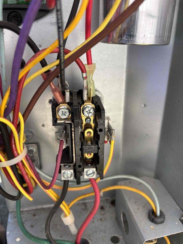 Completed annual cooling maintenance and inspected system per warranty concern regarding compressor not cycling off properly. Evaluated contactor operation, verified electrical connections at terminal blocks, and documented control panel wiring configuration with photos showing all power and control circuits functioning within specifications.
