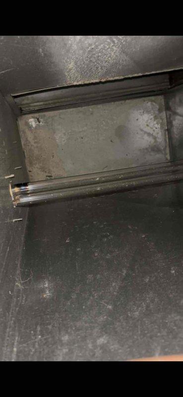 Completed annual cooling maintenance on a 7-year-old EcoAir system with a 2019 condenser model. Inspected the Nature's Home Quantum 25A BASIC LED III control box mounted in the utility area, verified proper electrical connections and power supply functionality. Examined interior ductwork components, noting normal operational dust accumulation on metal surfaces and confirmed damper mechanism rods were intact and functioning properly.
