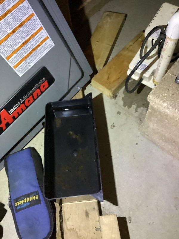 Completed annual cooling maintenance on 9-year-old Goodman air conditioning system. Inspected electrical components including dual-run capacitor (40/5 MFD) and CoreSense diagnostic module, verified all wire connections secure, checked condensate drain system with drip pan, and confirmed unit operational. All components functioning within normal parameters.