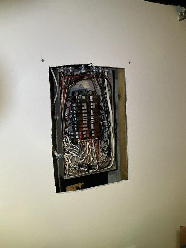 Conducted comprehensive assessment of existing 100-amp electrical service panel in 1964-built residence to provide quote for upgrade to 200-amp service. Inspected current panel configuration, circuit breaker arrangement, wire gauge and condition of existing conductors, and evaluated service entrance capacity to determine scope of work required for main service upgrade to meet modern electrical demands and code requirements.