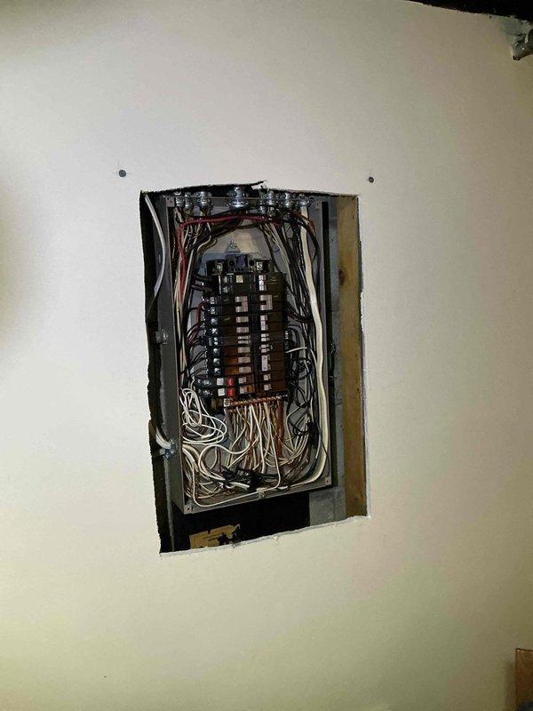 Conducted comprehensive assessment of existing 100-amp electrical service panel in 1964-built residence to provide quote for upgrade to 200-amp service. Inspected current panel configuration, circuit breaker arrangement, wire gauge and condition of existing conductors, and evaluated service entrance capacity to determine scope of work required for main service upgrade to meet modern electrical demands and code requirements.