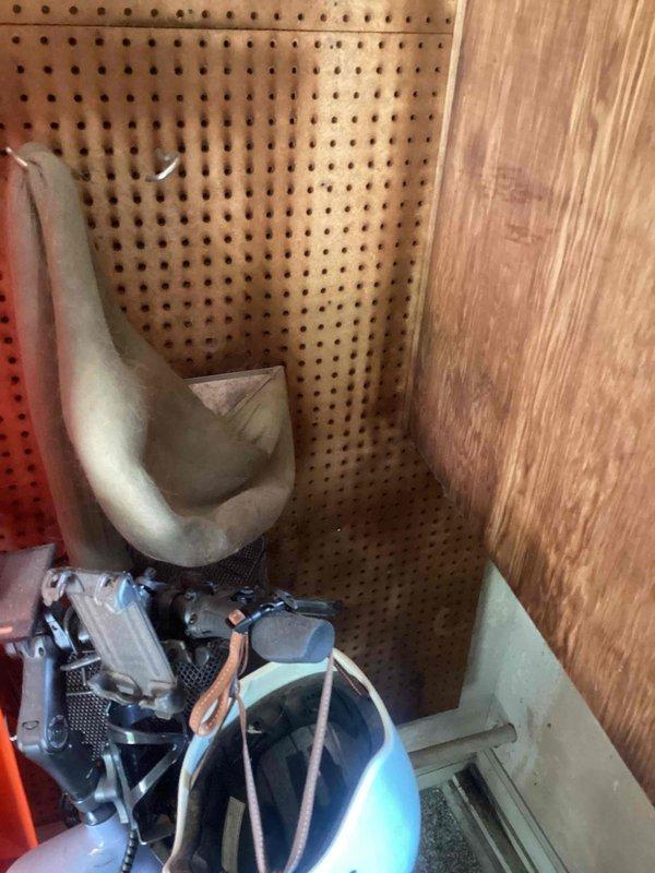 Relocated dryer ventilation system to exhaust through home and garage, rerouting metallic ductwork and repositioning mechanical components within confined cabinet space. Provided estimate for faucet replacement and repair of leaking pipe, documenting existing plumbing conditions with photographs showing HVAC equipment, copper tubing, and mechanical connections in utility enclosure.