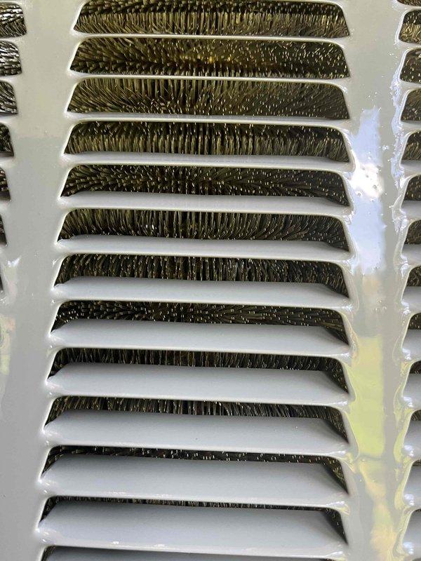 Completed annual cooling maintenance on 9-year-old Trane system. Performed comprehensive tune-up including system inspection, performance testing, and documentation with photos. Noted significant accumulation of organic matter and debris within return air vent louvers requiring attention for optimal airflow and indoor air quality.