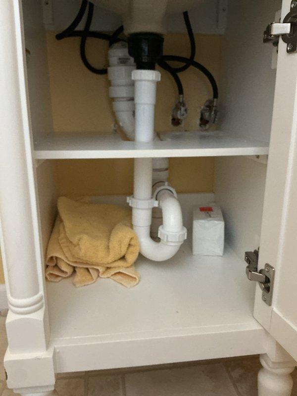 Completed installation of new toilet and bathroom vanity as quoted. Toilet was properly set with new wax ring seal and supply line connection, verified level placement and secure mounting to floor flange. Vanity cabinet installation included mounting sink basin, installing P-trap drain assembly with compression fittings, and connecting water supply lines. All plumbing connections were tested for leaks and proper drainage confirmed. Work completed within the 4-hour timeframe with complete working order verification.