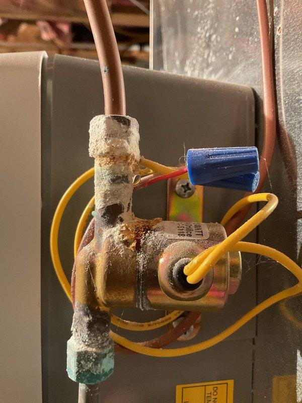 Responded to no heat call on 12-year-old EnergiAir furnace system. Upon arrival, confirmed unit was not operational. Inspection revealed worn heat exchangers presenting safety concerns, requiring system shutdown per manufacturer and safety guidelines. Identified frost accumulation on refrigerant lines indicating potential issues with cooling system components. Documented equipment condition with photos showing basement HVAC installation, worn furnace components, and icing on copper refrigeration lines. Advised customer of heat exchanger failure and safety implications. Due to compromised heat exchanger condition, unit could not be safely restored to operation. Discussed replacement options and system age considerations given 2013 installation date.