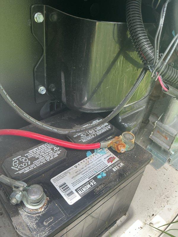Completed scheduled three-year tune-up maintenance on Generac generator unit. Performed comprehensive inspection of all major components including cooling system hoses, heat exchanger, battery terminals, and electrical connections. Observed corrosion buildup on battery terminals requiring attention during routine maintenance cycle. All hoses, clamps, and mechanical connections verified secure and functioning properly.
