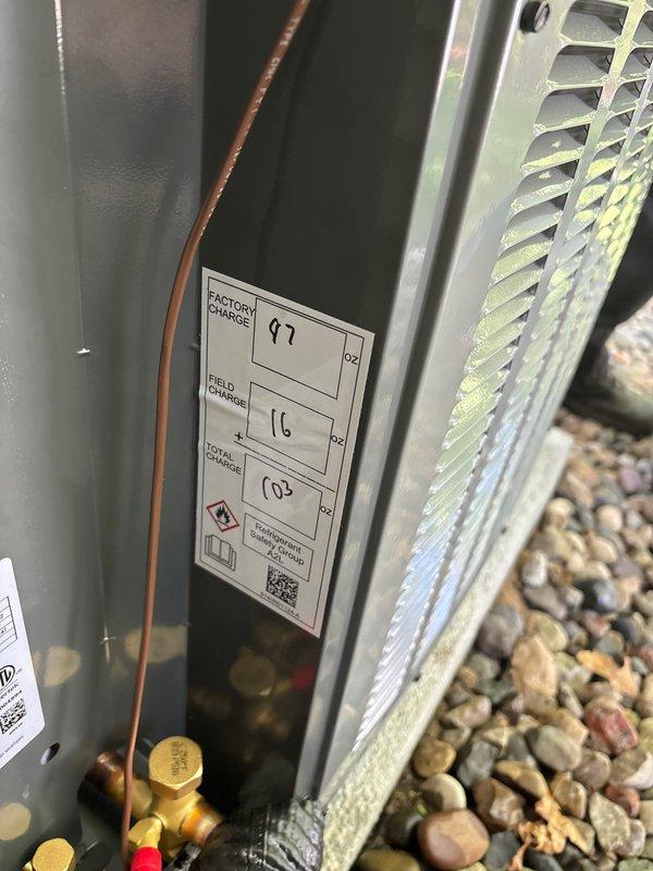 Completed full air conditioning system replacement at residential property. Installed new outdoor condensing unit on existing concrete pad with proper clearances, connected refrigerant lines with appropriate field charge added to factory charge for total system capacity, and verified all electrical connections including disconnect box and conduit routing. System tested and operational upon completion.