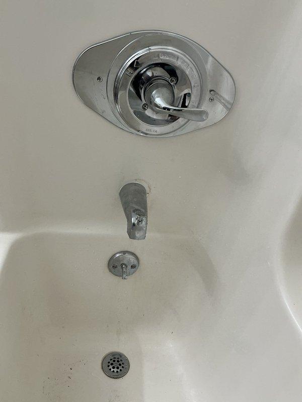 Completed shower valve replacement in residential bathroom. Removed existing worn valve assembly and installed new chrome-finished shower control valve with multi-function showerhead. Verified proper water flow, temperature control, and eliminated previous leaking issue. All fixtures tested and operational upon completion.