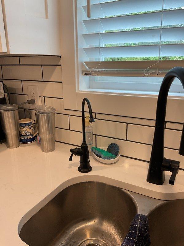 Responded to no-water issue at kitchen faucets following recent water service restoration. Accessed crawl space to inspect supply lines and verified proper water flow through main distribution system, including PEX and PVC supply lines. Restored full water pressure and functionality to kitchen sink faucets, including main gooseneck fixture and auxiliary filtration faucet, by addressing air lock in supply lines after municipal water turn-on.
