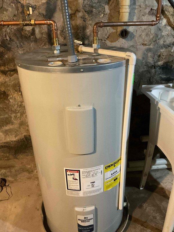 Replaced defective heating element on residential electric water heater. Unit was accessed in basement location, old heating element was removed and new element was installed with proper torque specifications. Verified all electrical connections were secure, tested unit operation, and confirmed hot water production was restored to normal function.
