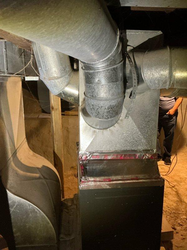 Conducted comprehensive estimate for air conditioning system installation at property with existing Goodman furnace and ductwork infrastructure in basement. Assessed current HVAC configuration including furnace unit with dual PVC venting, metallic supply ductwork with reflective insulation wrapping, and structural conditions of installation space. Documented existing equipment specifications, ductwork layout, available clearances, and utility connections to provide accurate AC system sizing and installation recommendations.