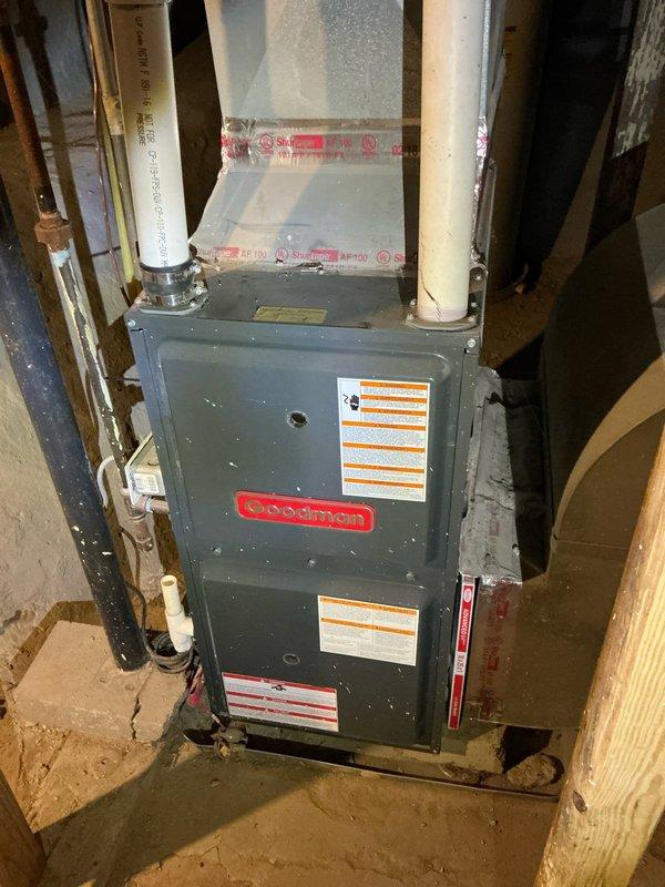 Conducted comprehensive estimate for air conditioning system installation at property with existing Goodman furnace and ductwork infrastructure in basement. Assessed current HVAC configuration including furnace unit with dual PVC venting, metallic supply ductwork with reflective insulation wrapping, and structural conditions of installation space. Documented existing equipment specifications, ductwork layout, available clearances, and utility connections to provide accurate AC system sizing and installation recommendations.