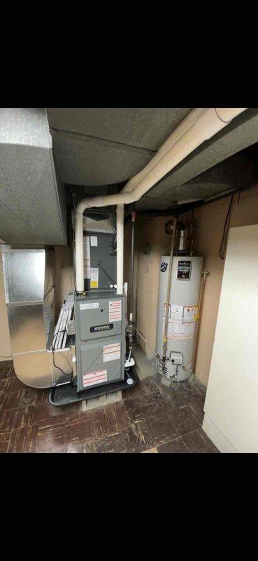 Completed full installation of new gas furnace and air conditioning system in residential basement utility room. Successfully positioned and secured furnace unit, connected ductwork to existing distribution system, and integrated all necessary gas lines, electrical connections, and condensate drainage. Verified proper system operation, airflow, and safety controls upon startup.