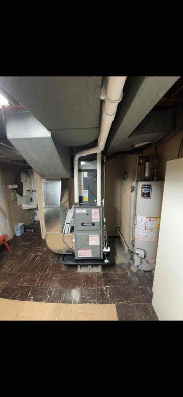 Completed full installation of new gas furnace and air conditioning system in residential basement utility room. Successfully positioned and secured furnace unit, connected ductwork to existing distribution system, and integrated all necessary gas lines, electrical connections, and condensate drainage. Verified proper system operation, airflow, and safety controls upon startup.