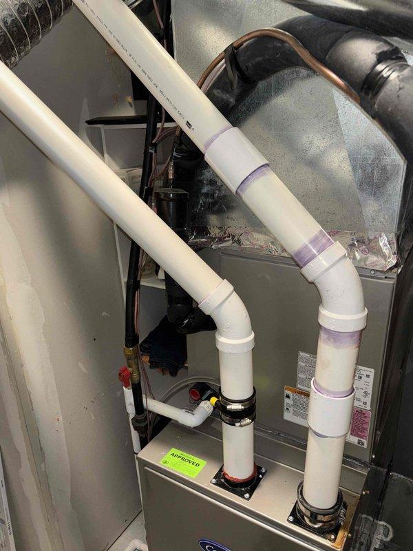 Completed annual cooling maintenance on 4-year-old Carrier system. Performed comprehensive tune-up inspection, verified proper operation of all components, and documented mechanical room installation including PVC condensate drainage system and refrigerant lines. All systems operating within manufacturer specifications with no issues found.