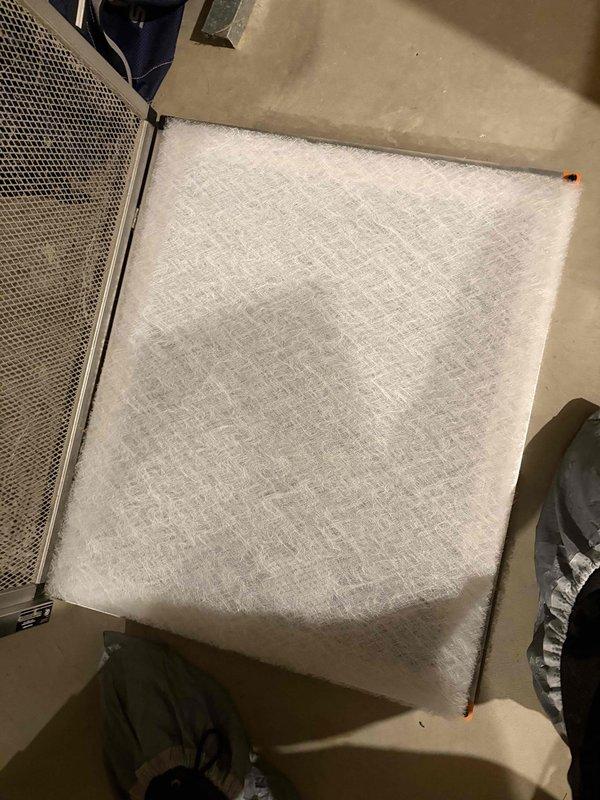 Completed annual cooling maintenance on 2020 EnergiAir system under 4-year warranty agreement. Inspected and replaced heavily soiled air filter showing significant dust and debris accumulation throughout mesh material. Performed standard AC tune-up procedures including system performance verification and operational testing to ensure proper cooling function for the season.