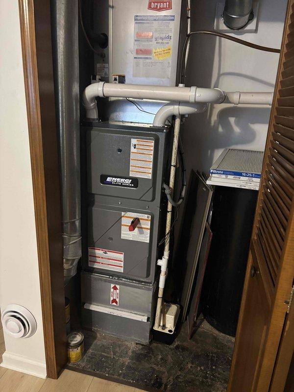 Responded to water leak from condensate pump on recently installed Bryant furnace system. Upon inspection, found condensate pump collecting dirty water with sediment and debris, indicating drainage issue. Removed and emptied contaminated water from pump pan, inspected pump operation and drainage lines, and verified proper condensate flow through PVC piping system to resolve leak condition.