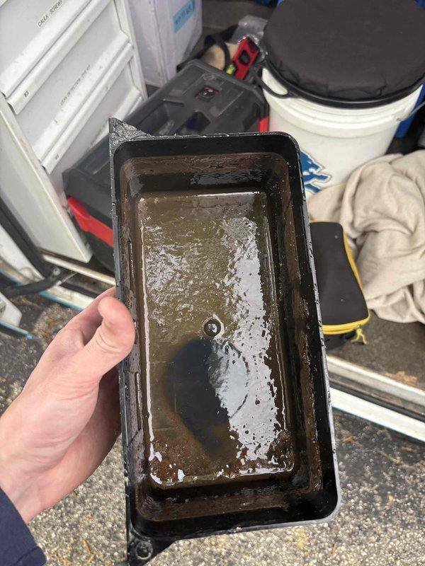 Responded to water leak from condensate pump on recently installed Bryant furnace system. Upon inspection, found condensate pump collecting dirty water with sediment and debris, indicating drainage issue. Removed and emptied contaminated water from pump pan, inspected pump operation and drainage lines, and verified proper condensate flow through PVC piping system to resolve leak condition.