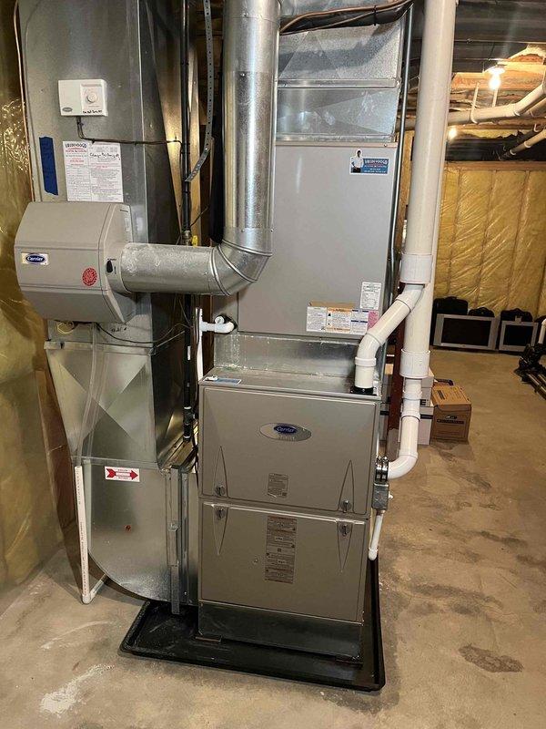 Completed annual cooling maintenance on 2015 Carrier HVAC system with 7 years of service history. Performed comprehensive inspection of furnace unit, ductwork, humidifier connections, and condensate drainage system; all components found operating within normal parameters with no deficiencies noted. System cleaned, tested, and left in proper working condition.