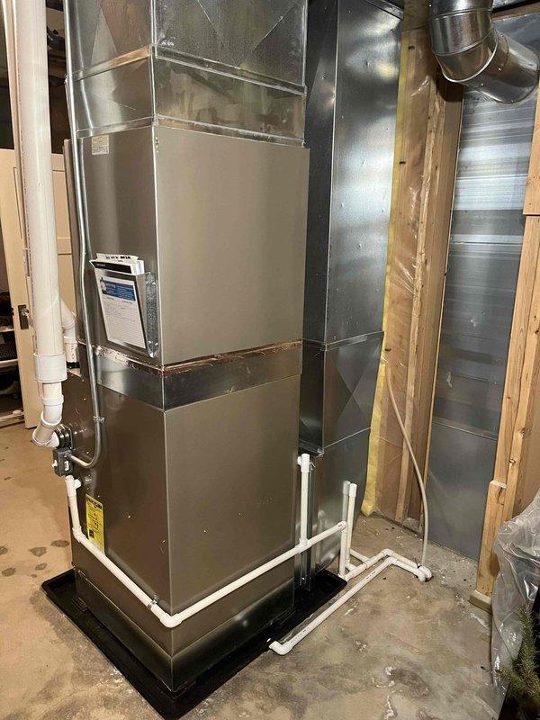 Completed annual cooling maintenance on 2015 Carrier HVAC system with 7 years of service history. Performed comprehensive inspection of furnace unit, ductwork, humidifier connections, and condensate drainage system; all components found operating within normal parameters with no deficiencies noted. System cleaned, tested, and left in proper working condition.